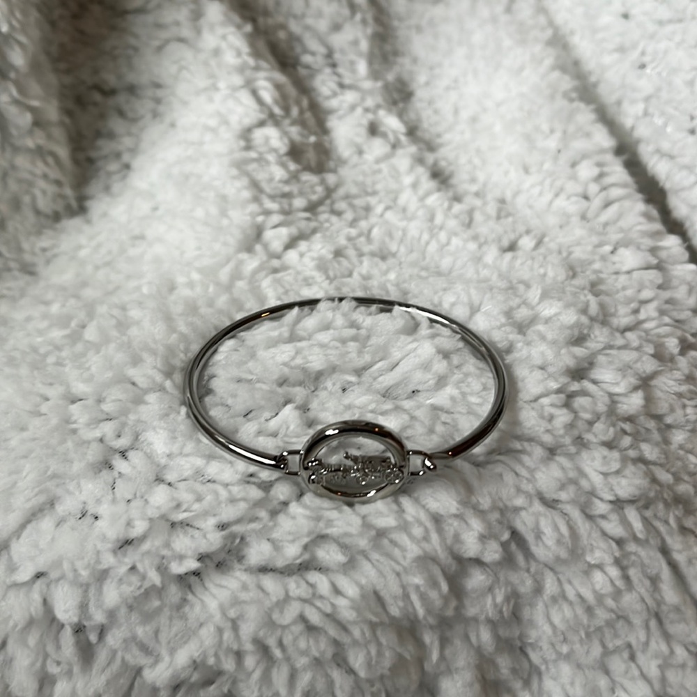 Coach silver bangle with horse and coach emblem